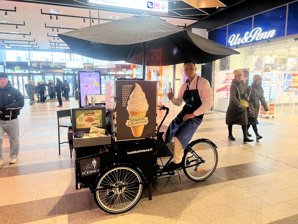 Icebike operator serving soft serve